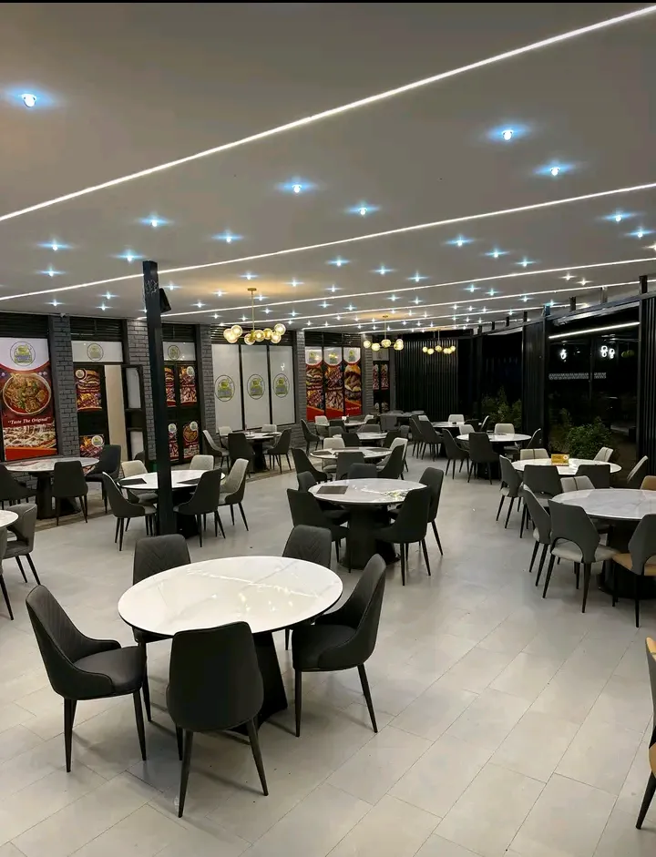 A full restaurant of happy guests enjoying their meals at YPA